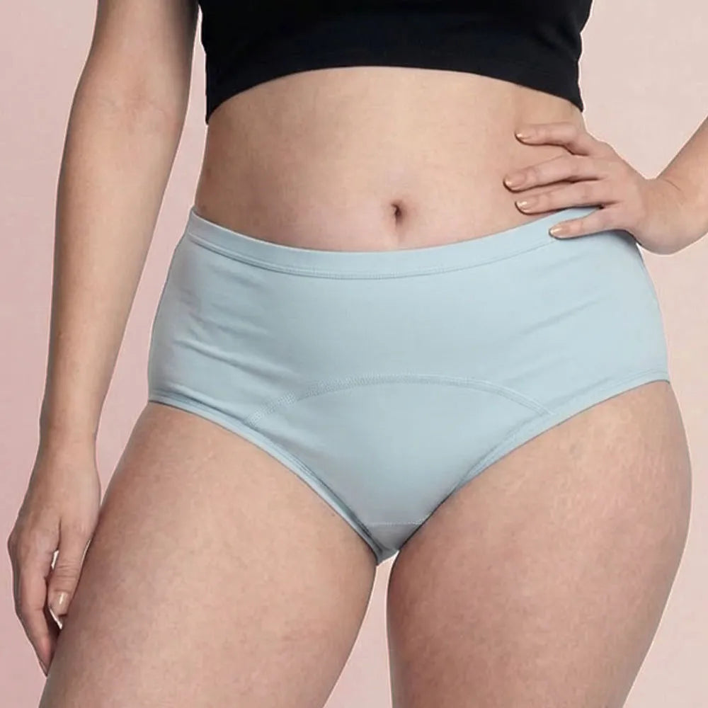 Woman wearing blue Extra Comfort Leakproof Underwear for comfortable leak protection