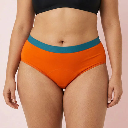 Woman wearing orange Color Flex Leakproof Underwear with smooth fit
