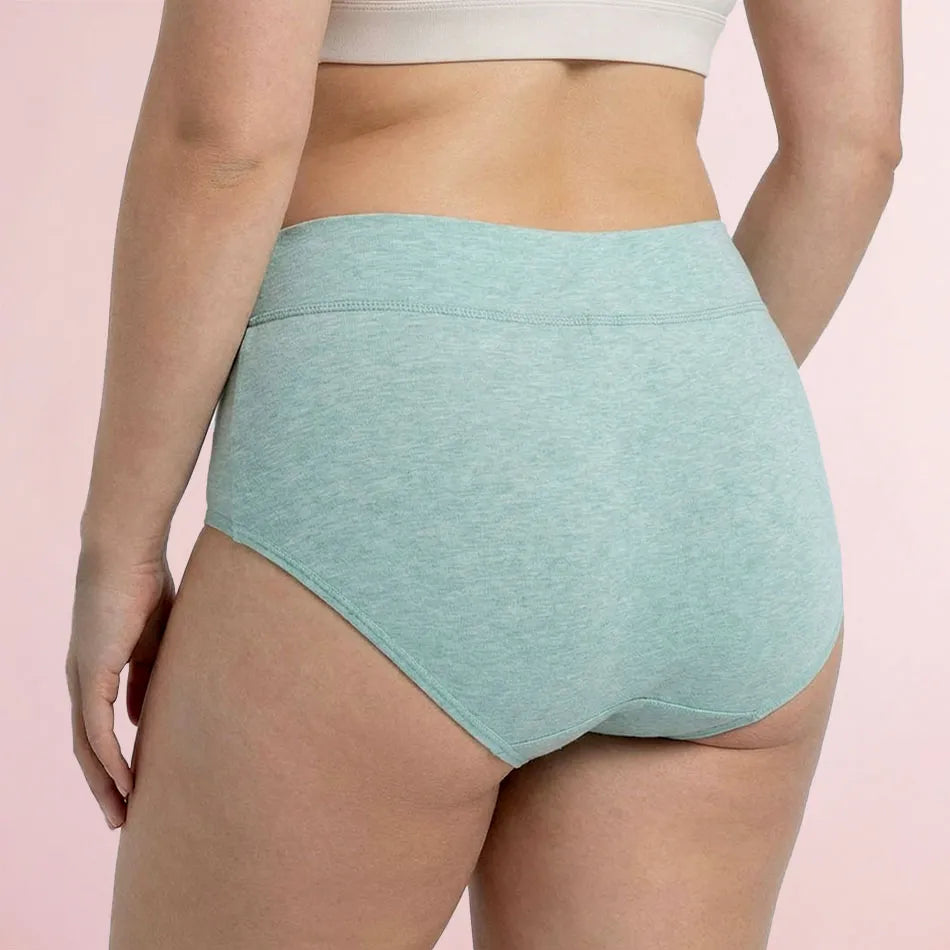 Woman wearing teal Pure Balance Leakproof Underwear back view